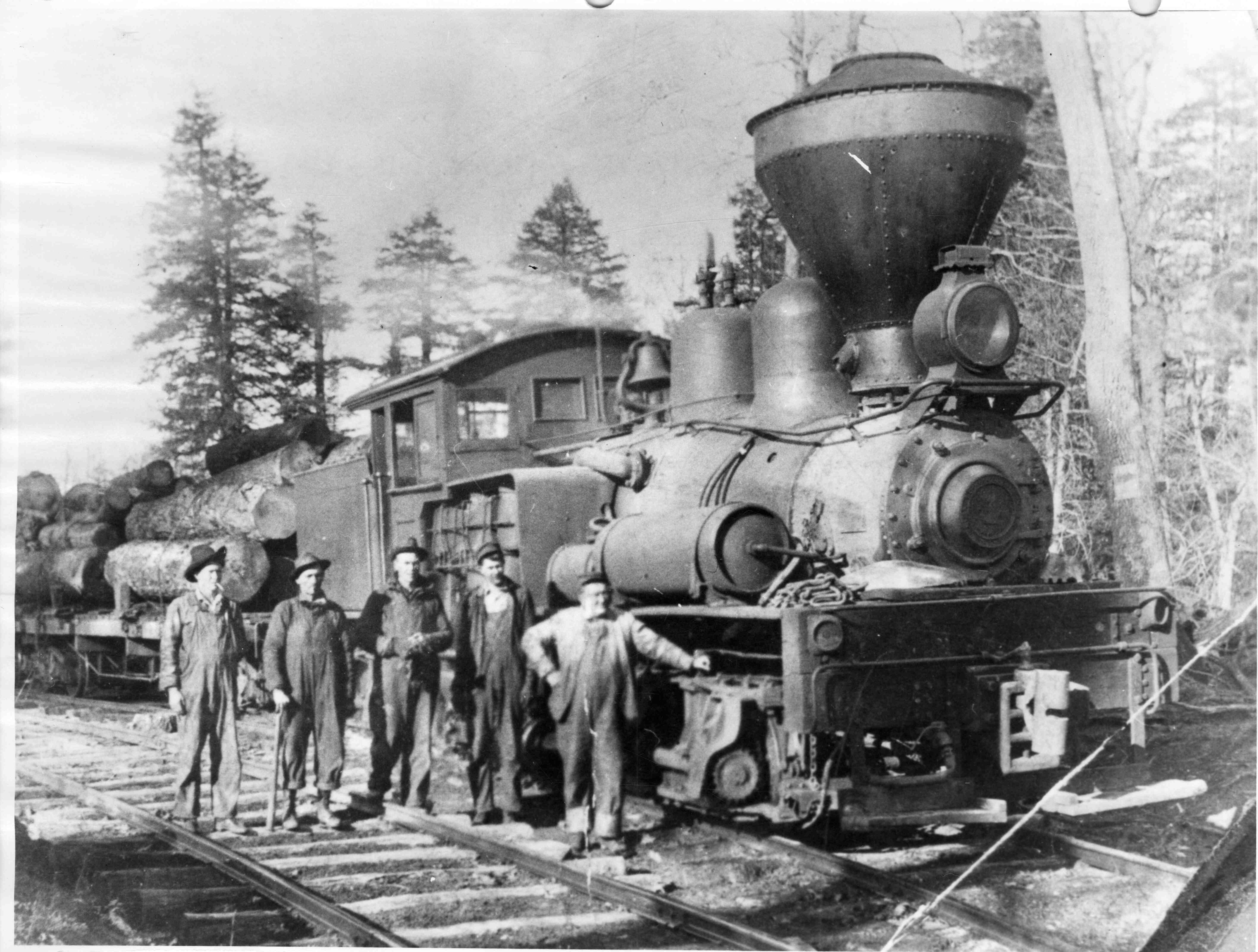 A Shay locomotive and logging crew at Moltz Lumber Company, photographed by Joseph Wilde