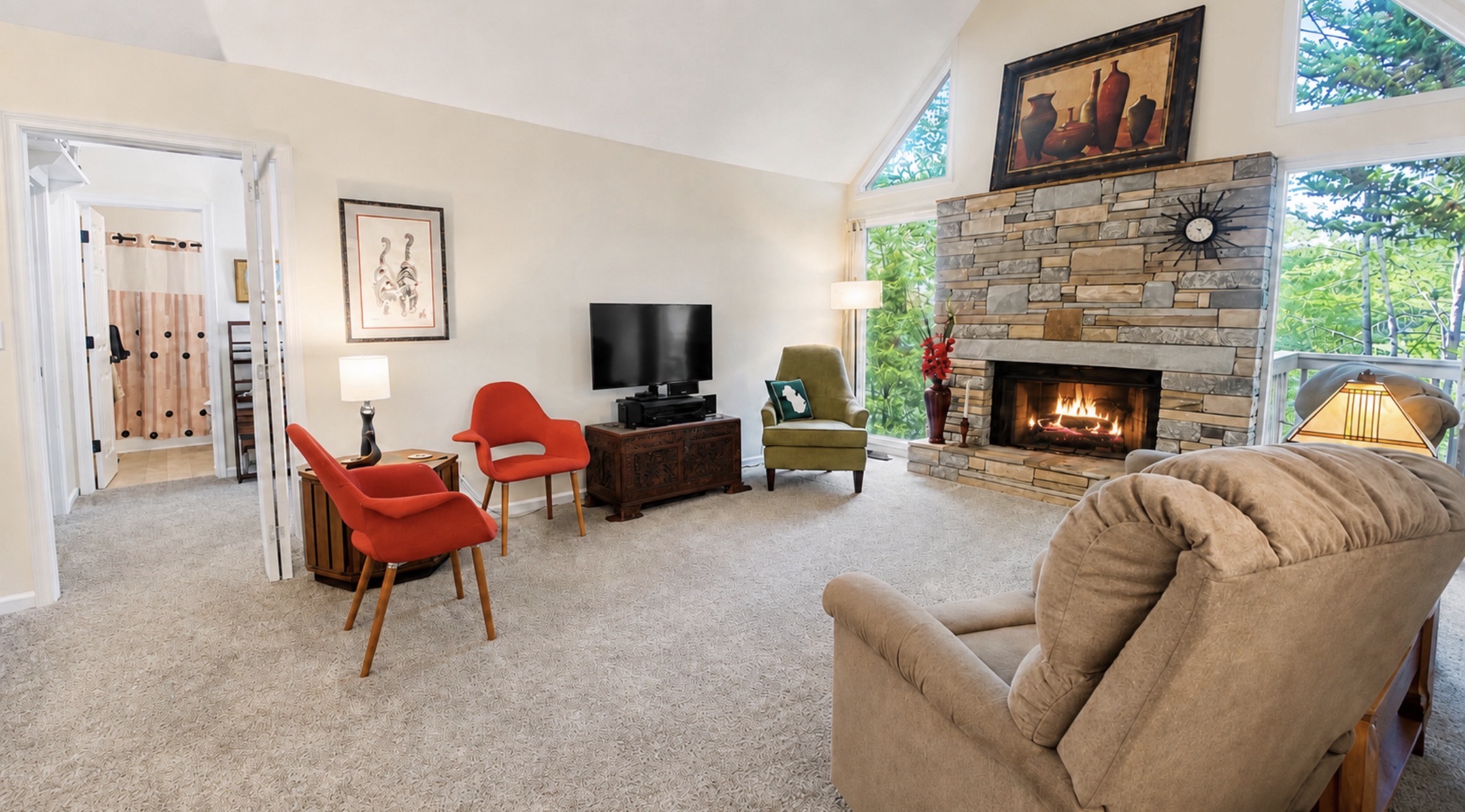 2698 Connestee Trail, Brevard, NC, living room with vaulted ceiling and stone fireplace